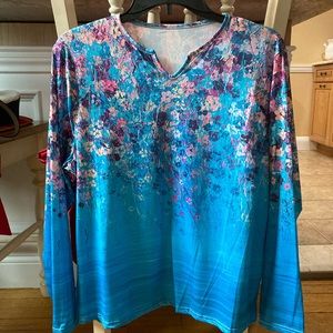 4 pretty, light women’s shirts.